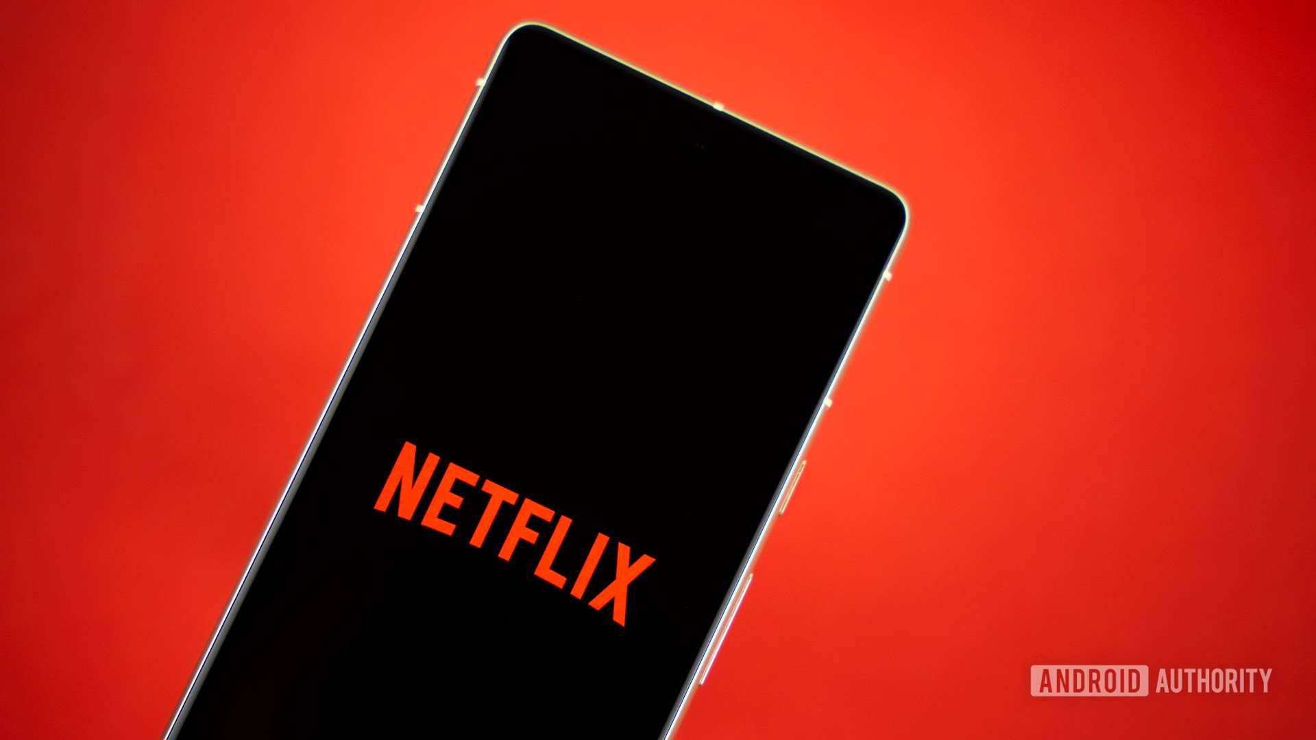 Netflix logo on smartphone stock photo (3)