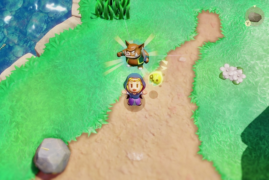 A top down scene from The Legend of Zelda: Echoes of Wisdom where Zelda captures a monster in a field