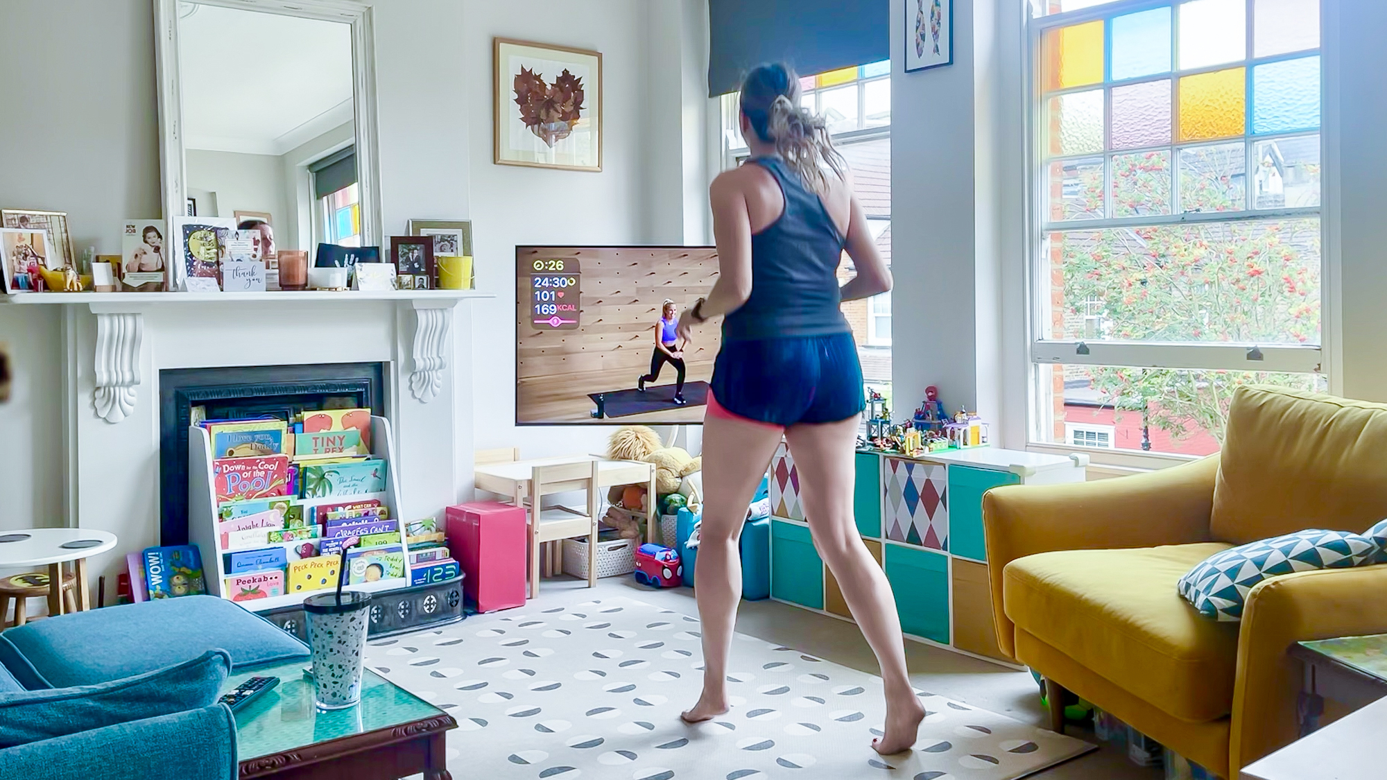 Stephanie Wood doing a bodyweight HIIT workout at home