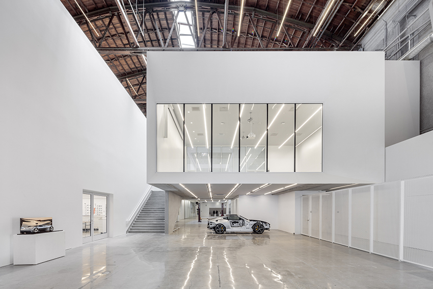 darin johnstone architects turns historic wind tunnel into mullin transportation design center