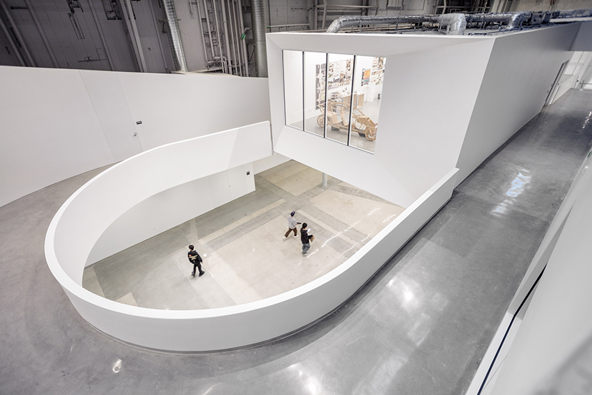 darin johnstone architects turns historic wind tunnel into mullin transportation design center