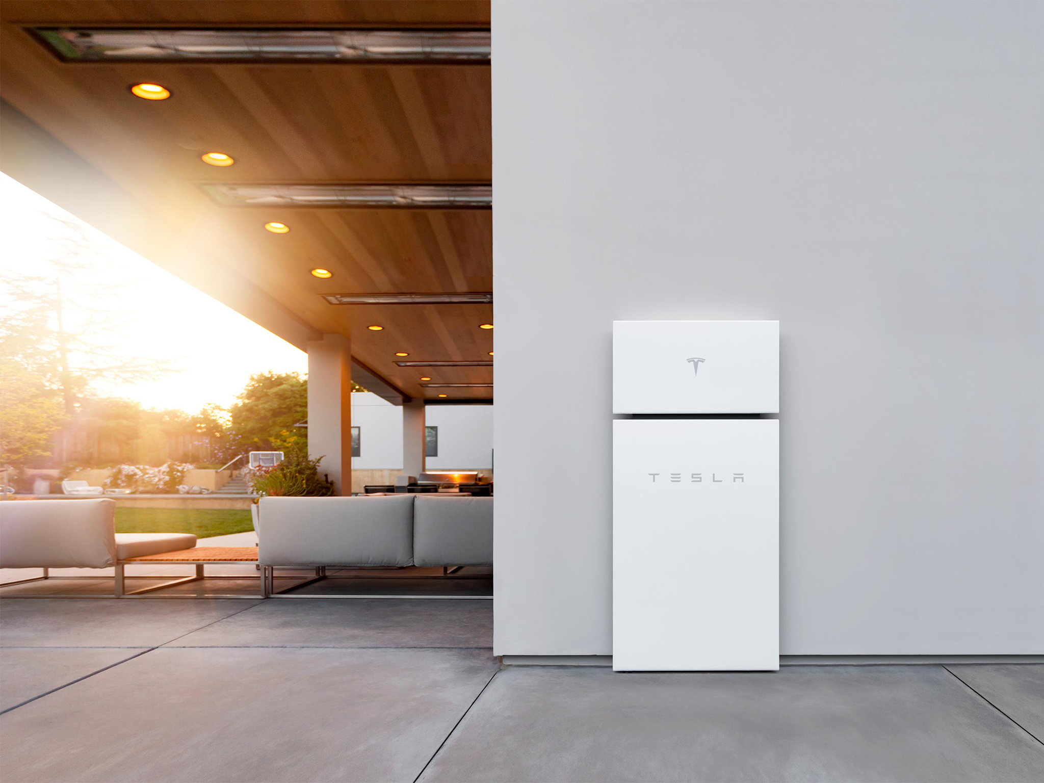 Tesla’s powerwall stores cheap energy generated from solar or the grid, and dispenses it overnight or when rates are higher