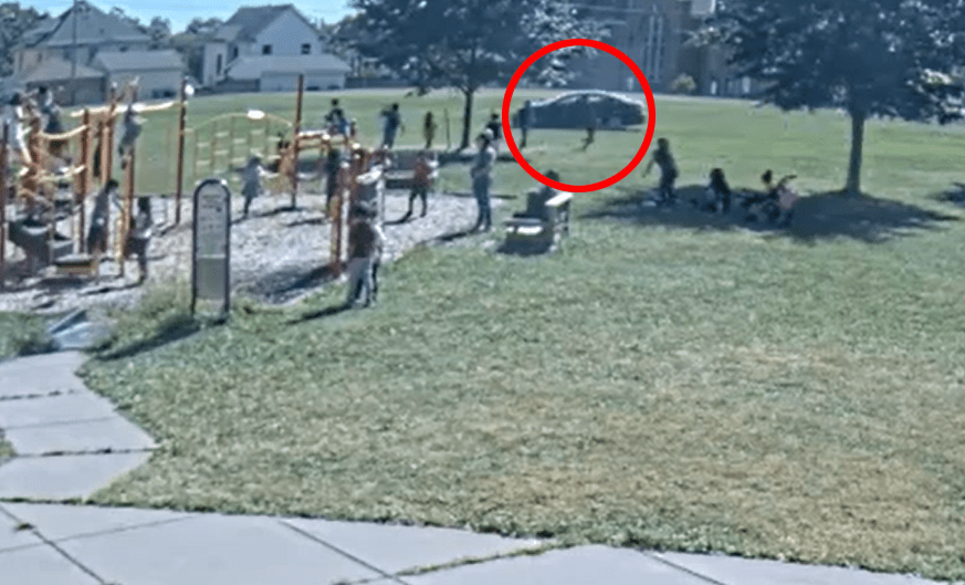 The black car could be seen driving on the grass three times