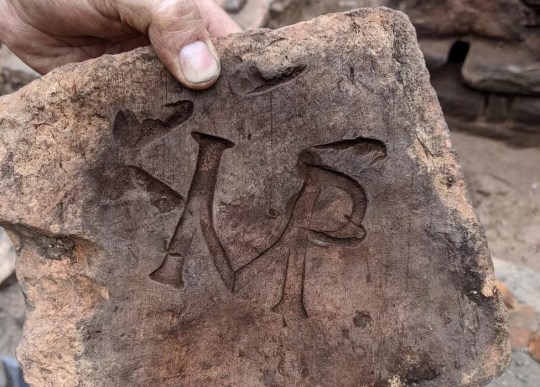 Titles found at a dig for a Roman baht house.