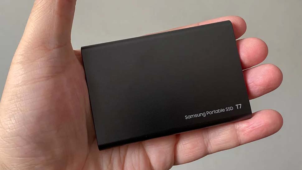 Samsung T7 SSD facing forward in hand.