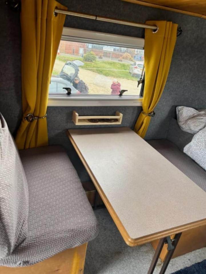 Inside the transformed military caravan is a dining area