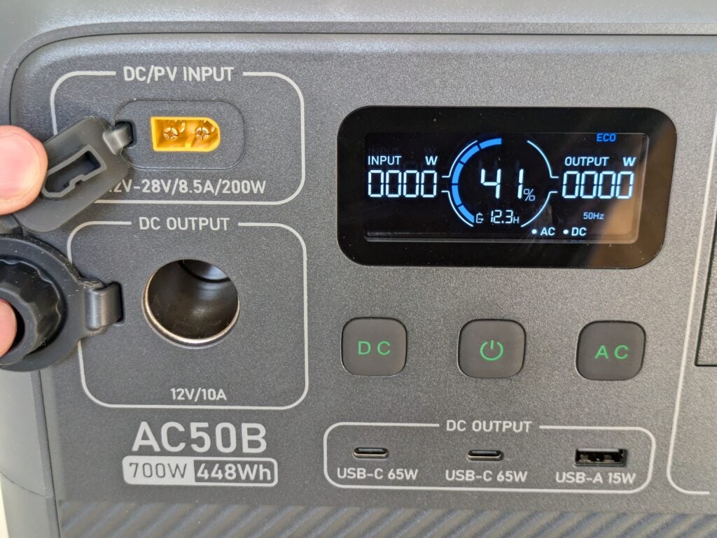 Detail photo showing the display, DC outputs and input