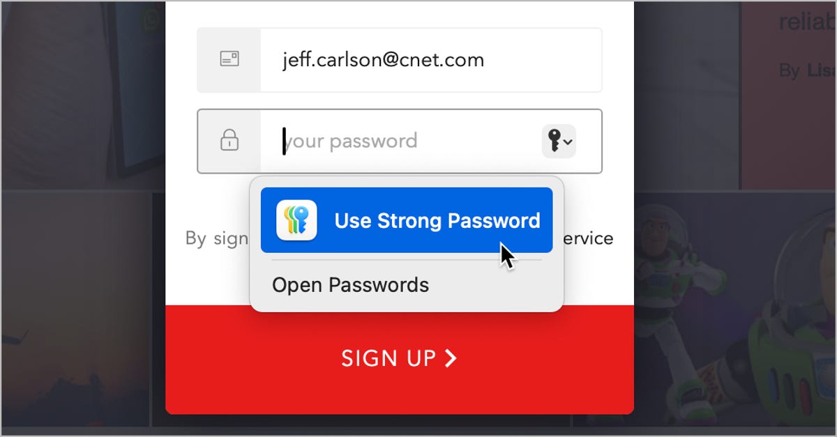 Login page showing a password field and a pop-up from Passwords with the option Use Strong Password.