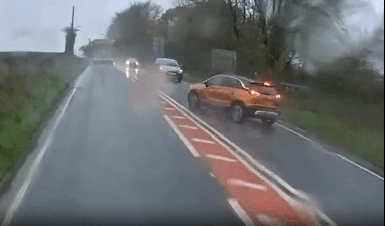 Dashcam footage captured the dramatic moment a driver smashes into oncoming traffic