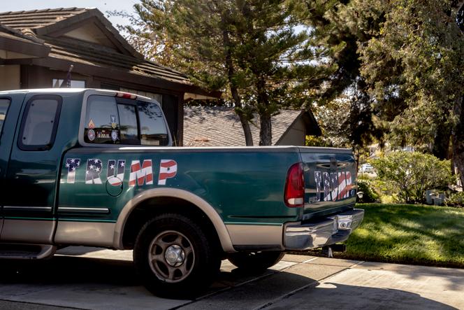 A car decorated with Trump stickers is seen outside a home in Discovery Bay, California, on Oct. 31, 2024.