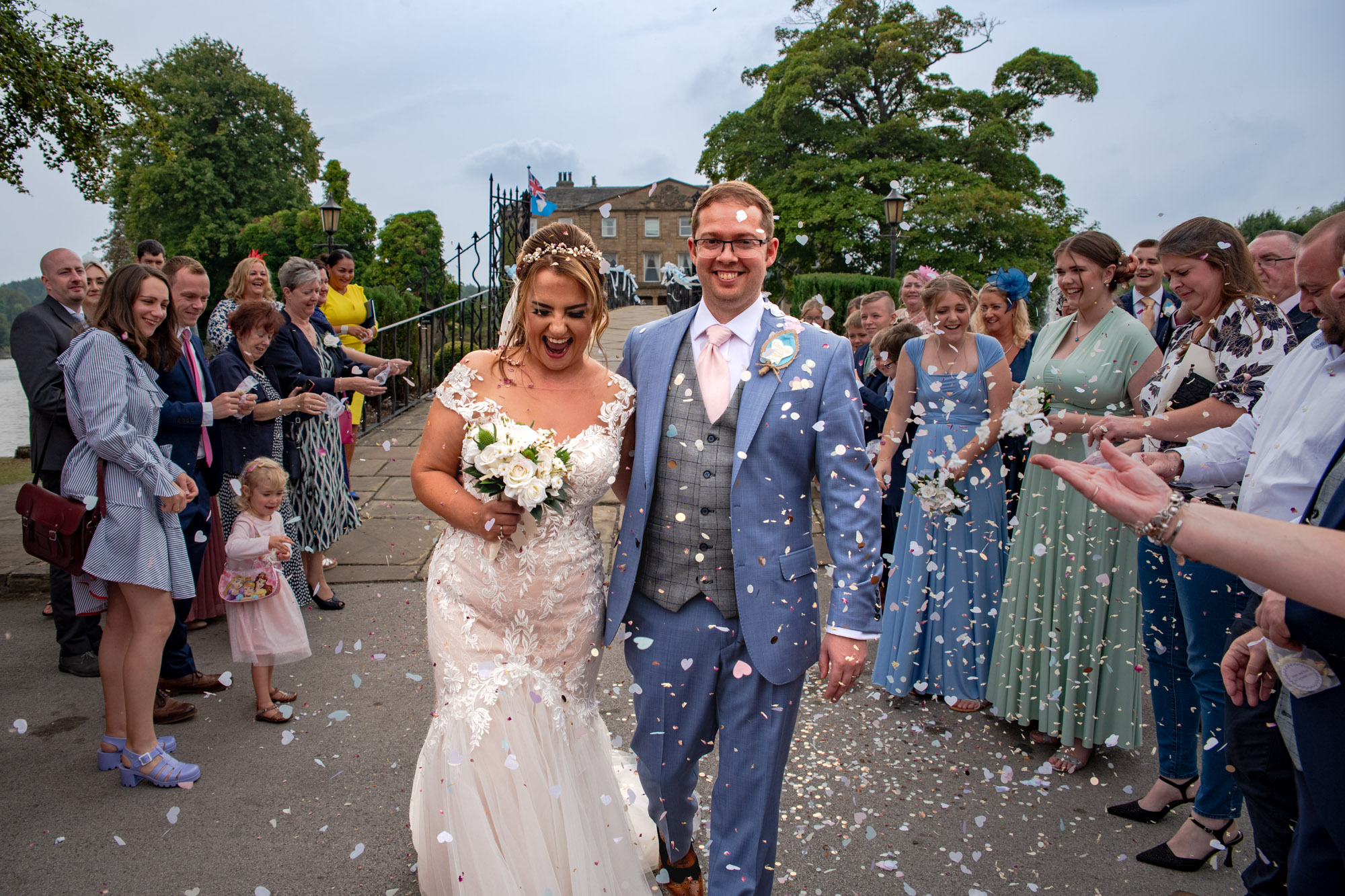 Bride and groom confetti walk at Waterton Park Hotel in Wakefield