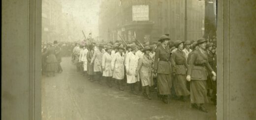 Elise's caption for the photo: “Woman’s (sic) Land Army 1917. Rally, at Birmingham, going to see the Whip. Me!!! 5th Land Girl on the left.”