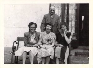 Joy's father, Hilda, Marjorie, and Joy's mother outside "The Homestead", London, 1943.