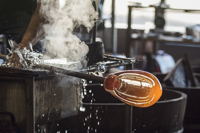 Man blowing glass