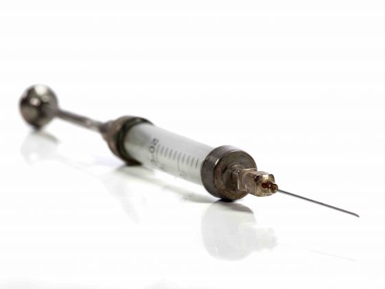 man injects himself with his semen