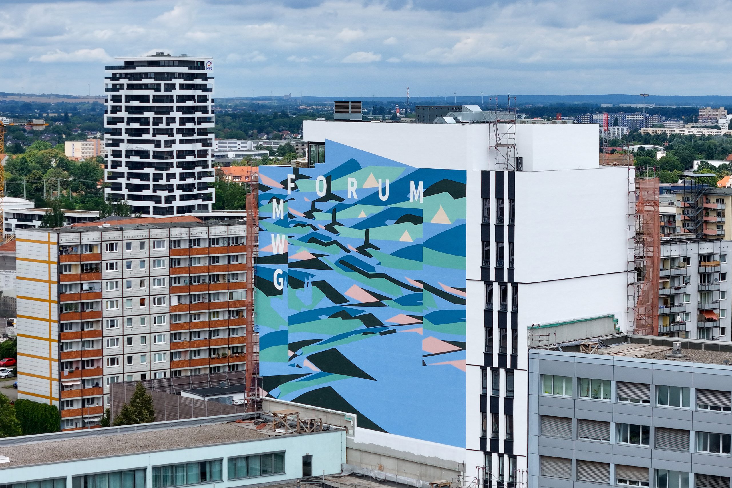 Eine Ansicht der finalen Fassadengestaltung des Künstlers KERA für die neue Geschäftsstelle der MWG-Wohnungsgenossenschaft eG Magdeburg
