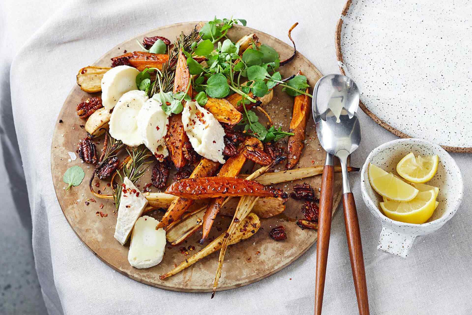 One-tray warm roast vegetable salad, chicken breasts meat, and avocado