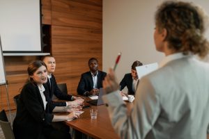 Policymakers gathered in a room - Photo by Alena Darmel on Pexels
