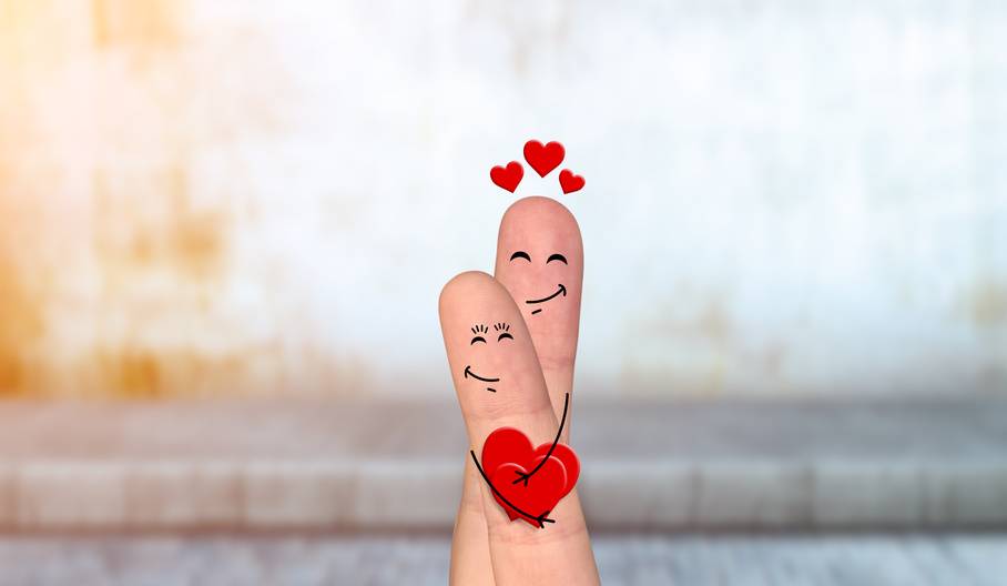 Happy finger couple in love celebrating Valentine day