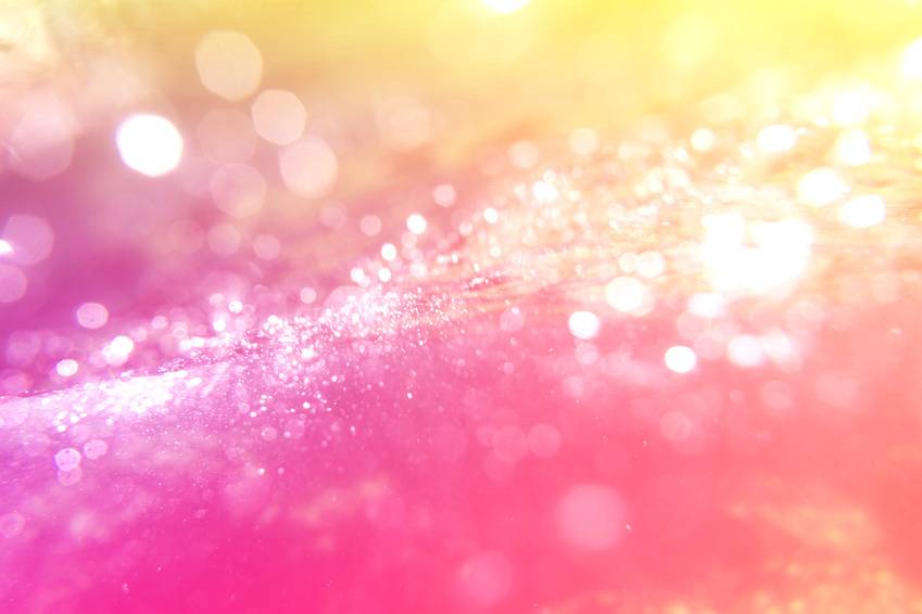 abstract bokeh light blur bubble background on pink zone