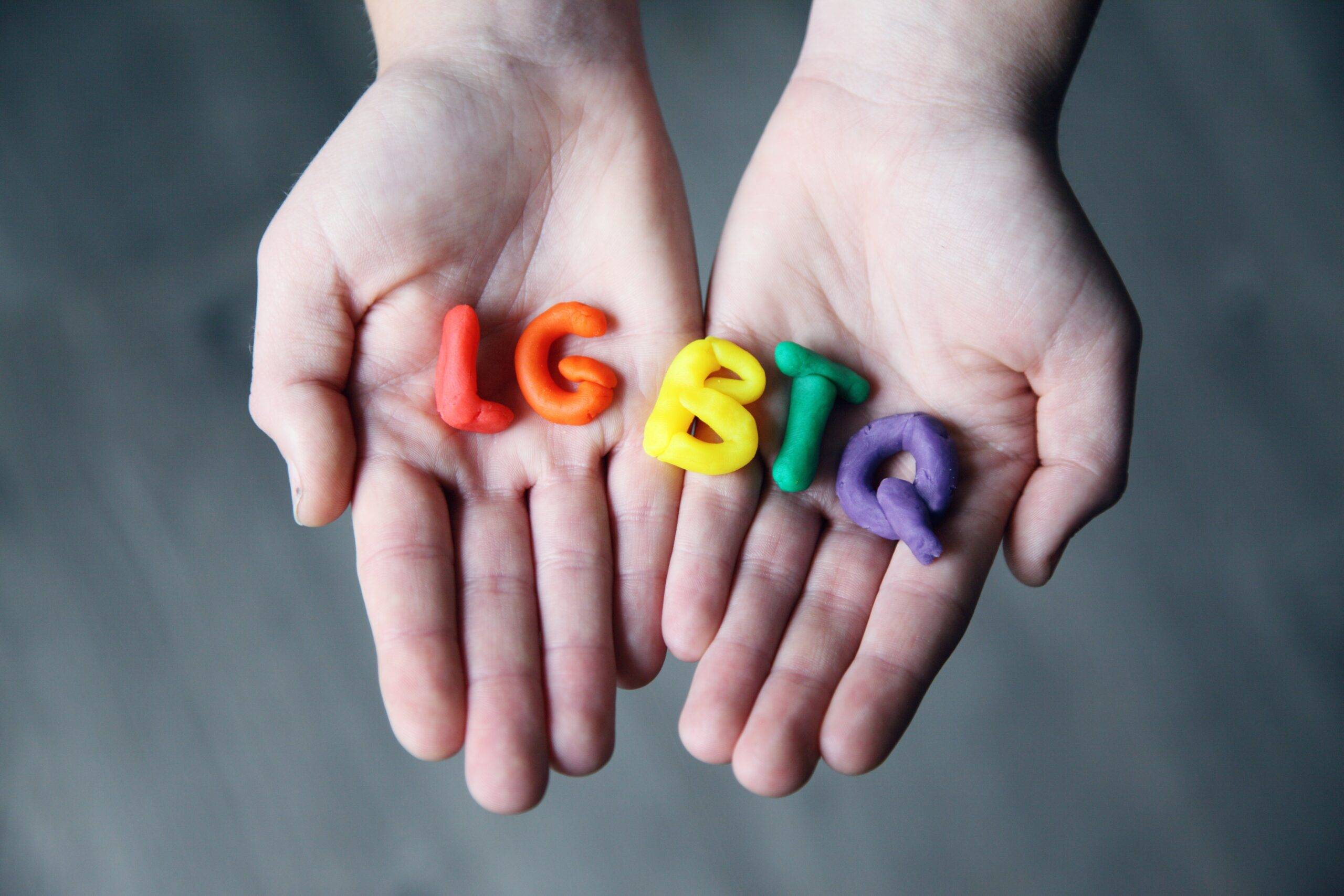 close-up-photo-of-lgbtq-letters-on-a-person-s-hands-1566842