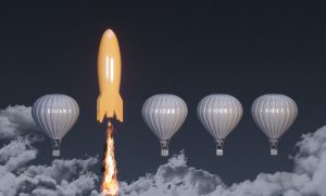 Orange coloured rocket rising on the top between the hot air balloons.