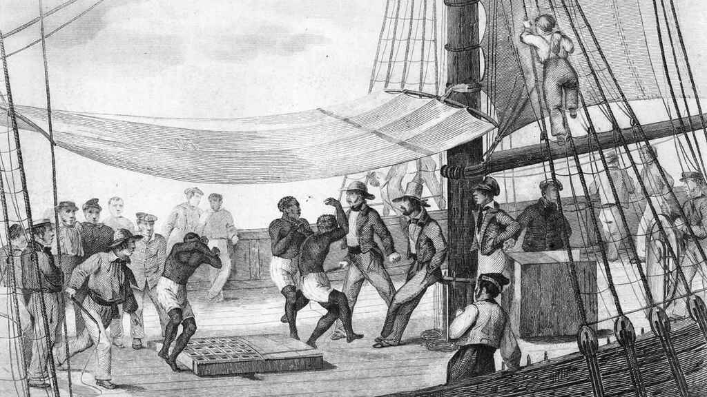 Una escena en un barco negrero con esclavos bailando entre marinos con látigos. Capitán Swing