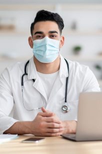 doctor-in-face-mask-working-on-laptop-2021-09-02-17-15-33-utc.jpg doctor-in-face-mask-working-on-laptop-2021-09-02-17-15-33-utc.jpg