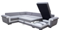 Salon yvette met bed en koffer open op witte achtergrond